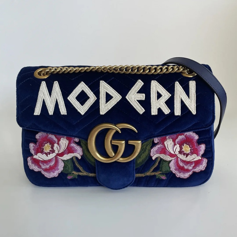 Gucci- Modern embroidered purse.
